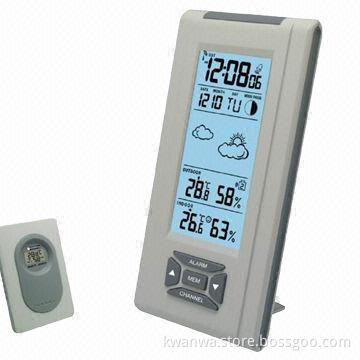 Radio controlled alarm clock with indoor and outdoor temperature and humidity display